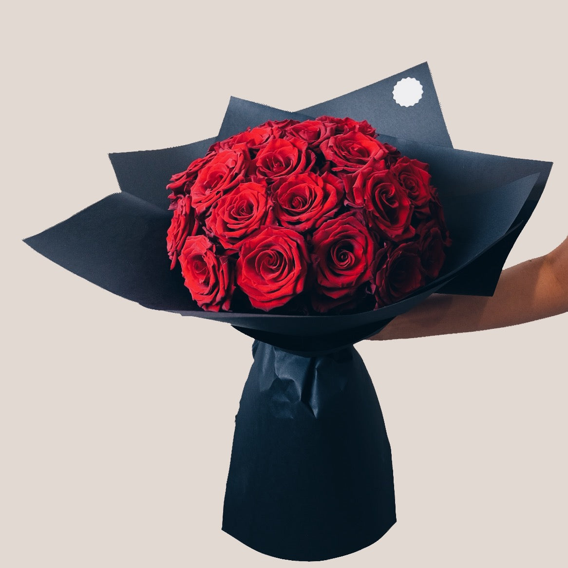 100 Red Roses Wpapped on Black Paper Bouquet